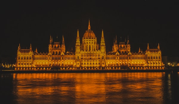Hungarian Parliament lit at night on the Danube, Budapest